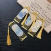 Chinese-style bookmarks with ancient charm and high appearance standards. Metal hollowed-out tassel bookmarks for giving to friends, classmates and teachers during graduation season Item Picture